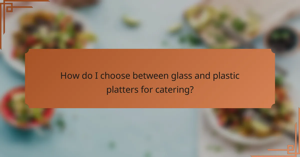 How do I choose between glass and plastic platters for catering?
