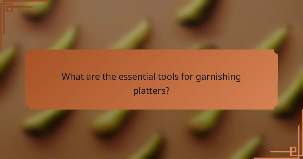 What are the essential tools for garnishing platters?